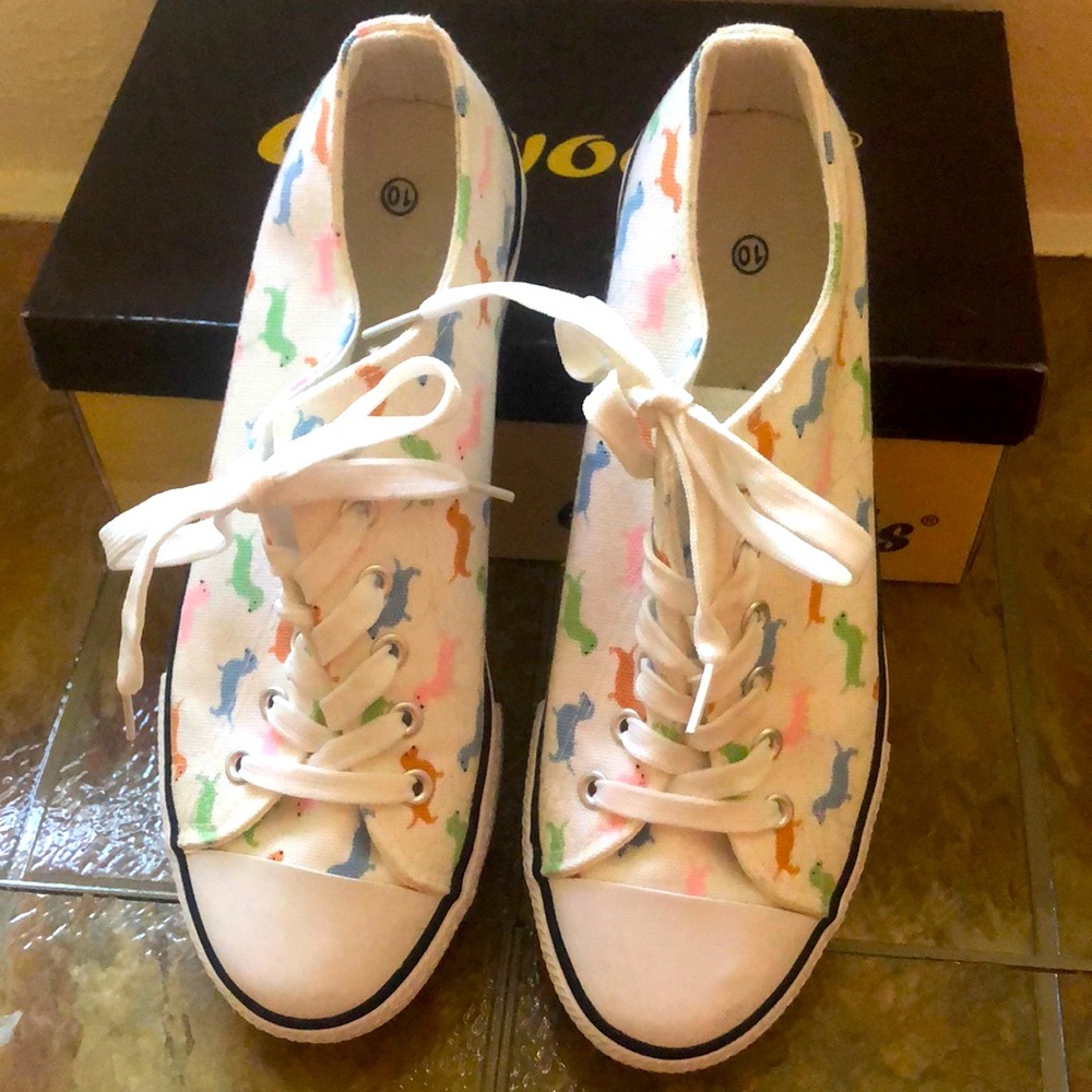 White sneakers with pastel colored weenie dog print